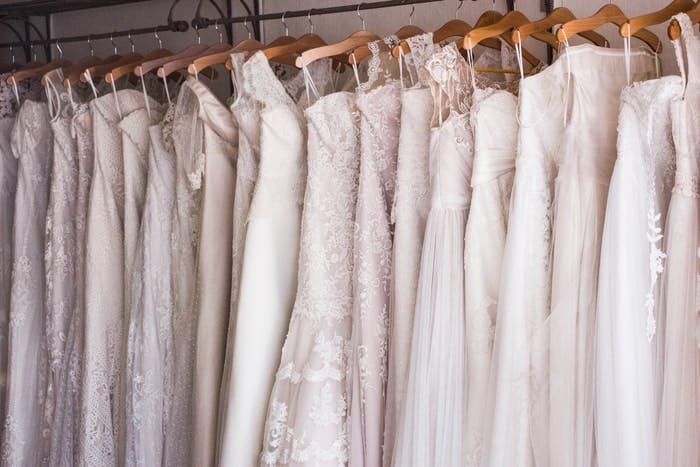 women's white dress on hangers