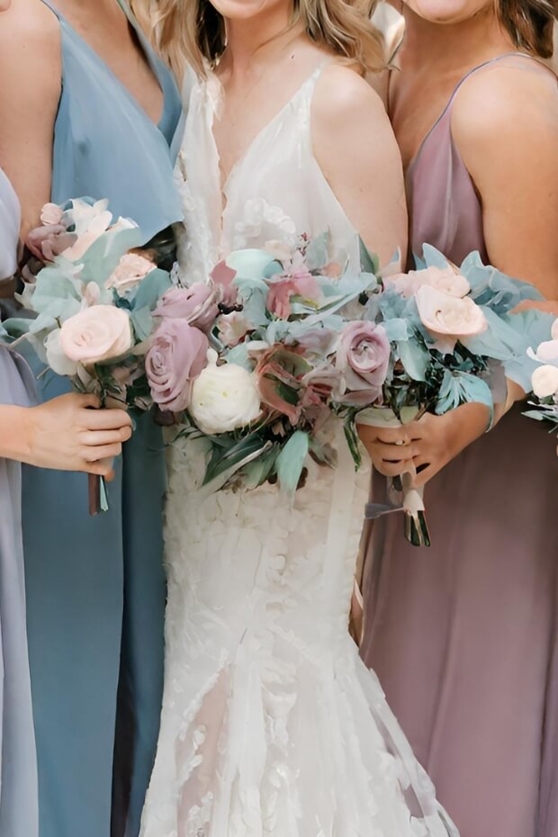 Bride and Bridesmaids in Purple and Blue Wedding Attire
