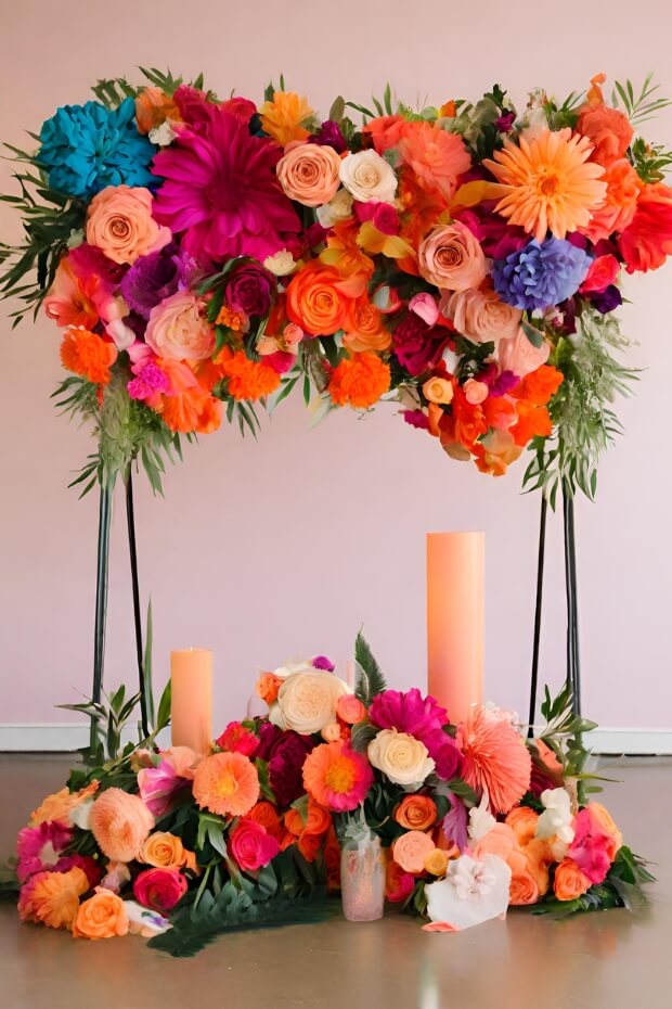 Colorful floral wedding backdrop with white fabric