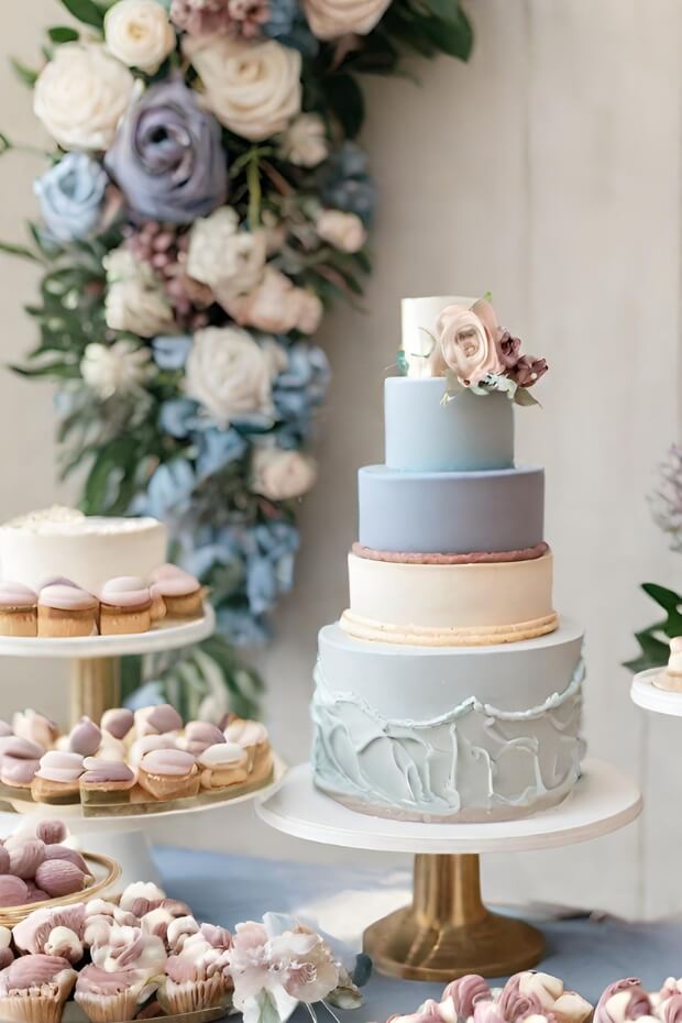 Intricate Multi-tiered Wedding Cake with Pastries