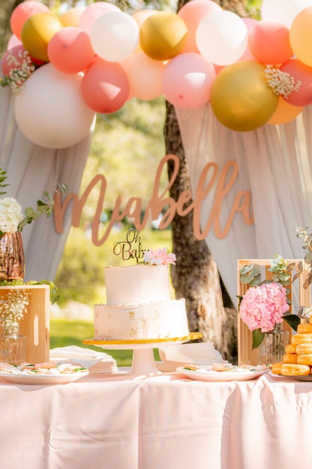 Outdoor wedding setup with colorful balloons