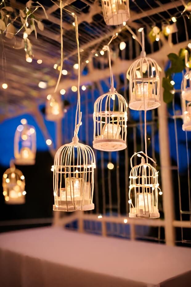 Romantic wedding decor with caged lanterns