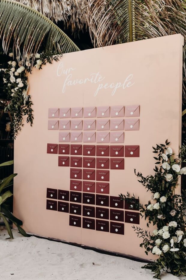 Wedding seating chart with brown envelopes