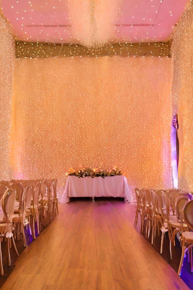 Wedding venue with ceiling and wall lights