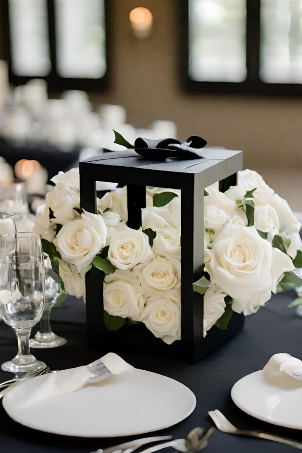 Black box with white flower centerpiece