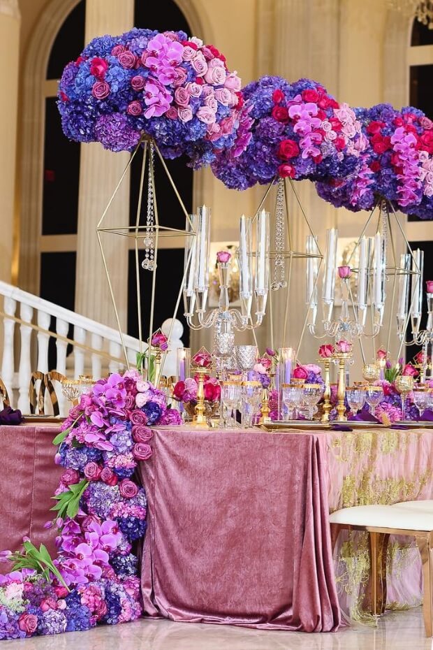 Luxurious purple wedding theme dining table setup