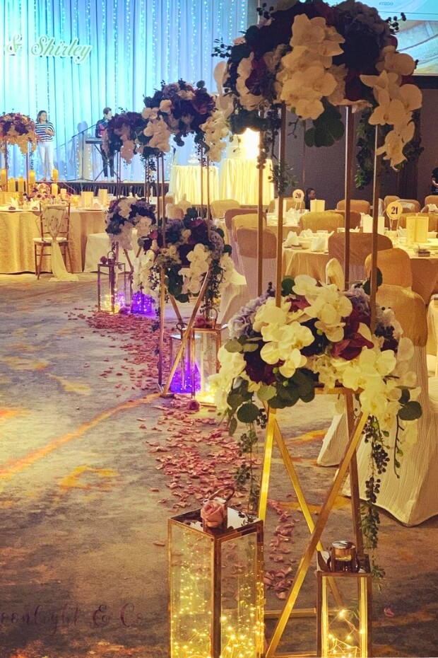 Romantic wedding setup with luxurious purple and gold decorations