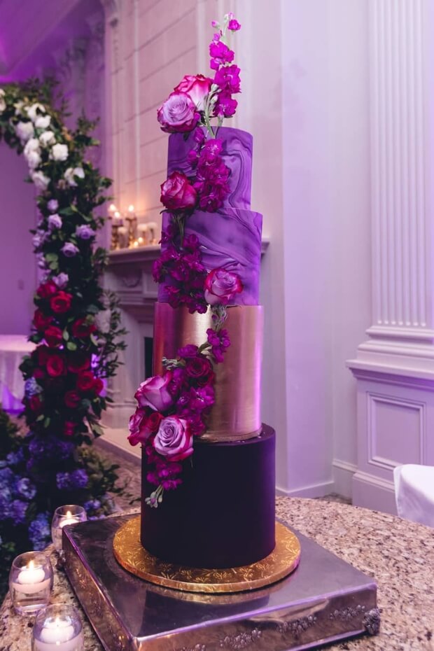 Stunning purple wedding cake with gold layer