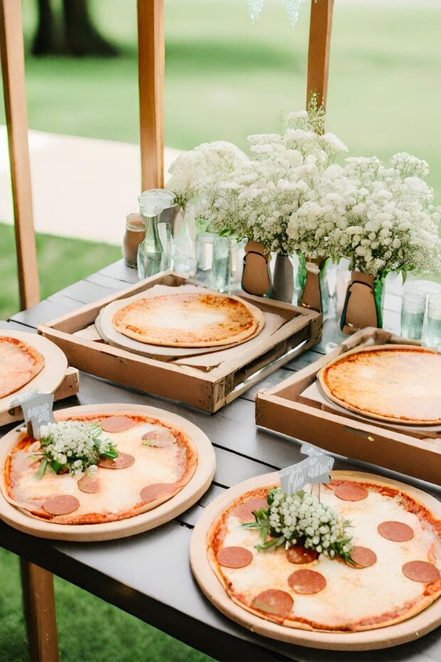 Wedding buffet table with pizzas
