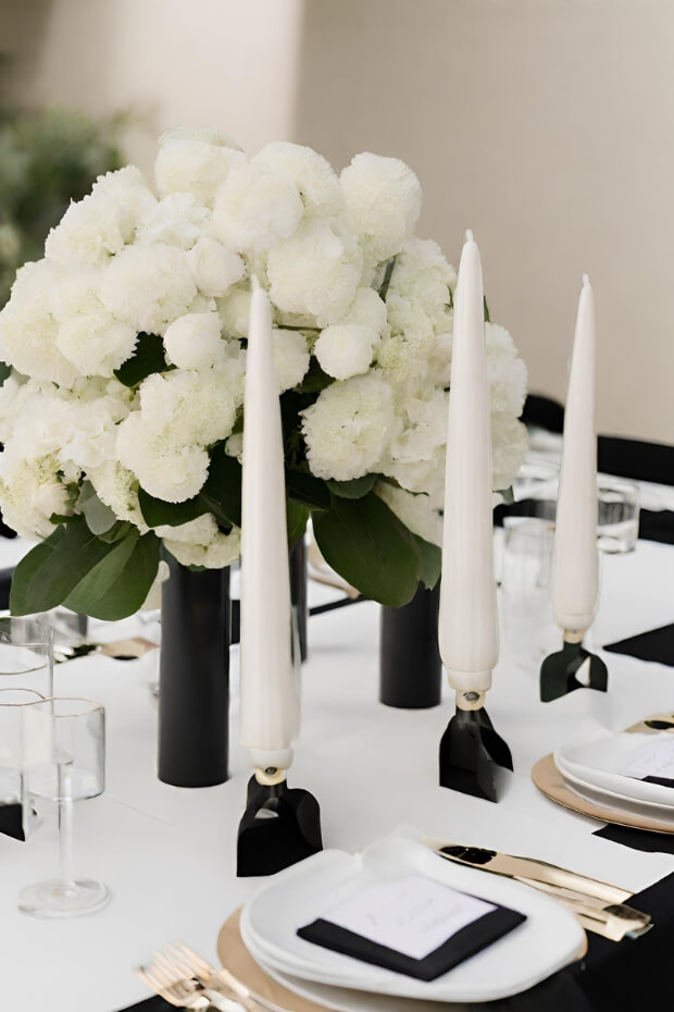 Elegant white and black centerpiece with gold band