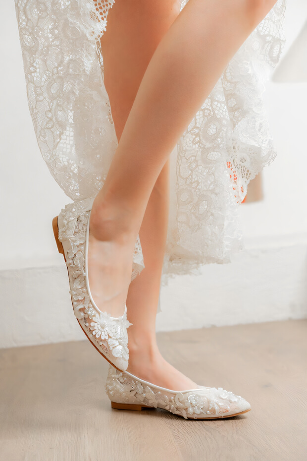 Boho white lace flats with intricate lace design, round toe, and low heel.