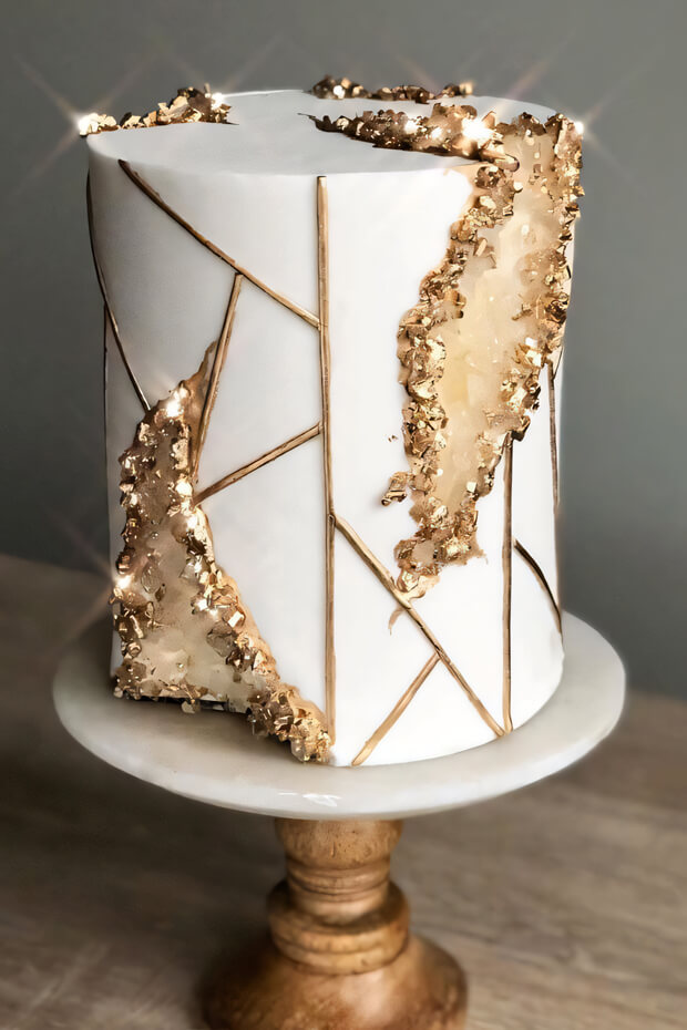 Color schemes that complement the boho aesthetic in geode-inspired cakes