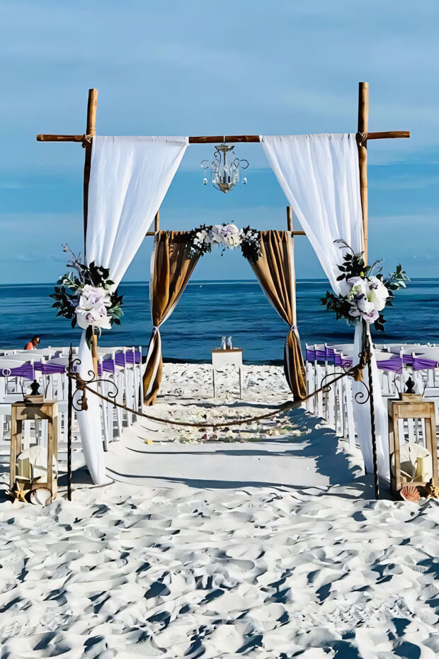 Beach wedding arch with burlap and lace