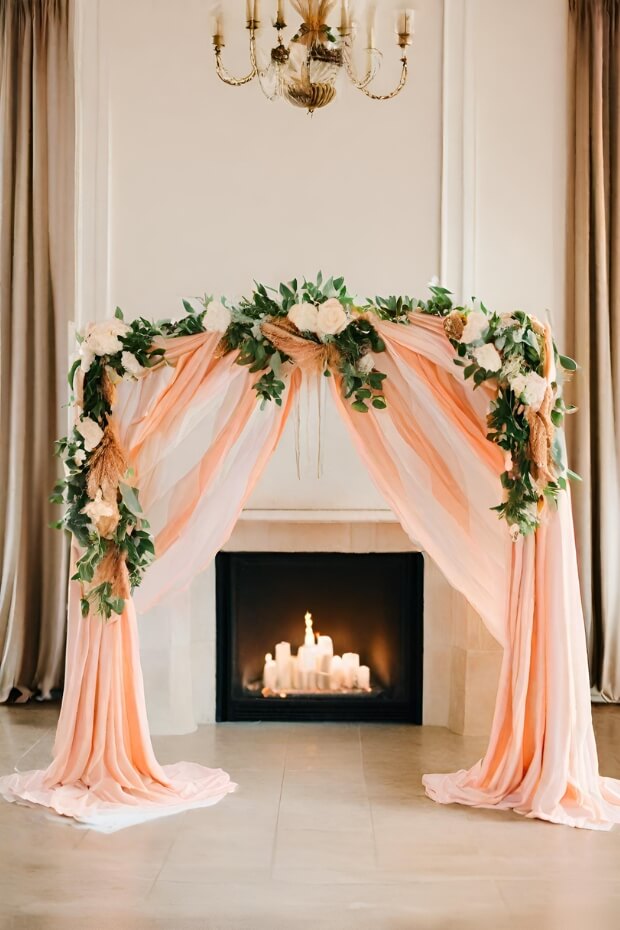 Floral Arch and Candles Wedding Fireplace Decor