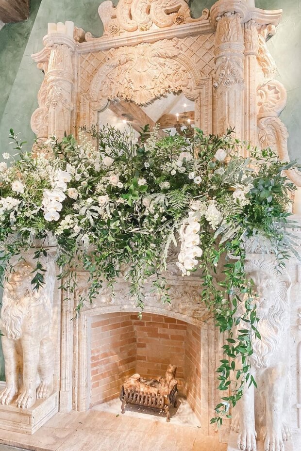 White Flowers and Greenery Wedding Mantel Decor