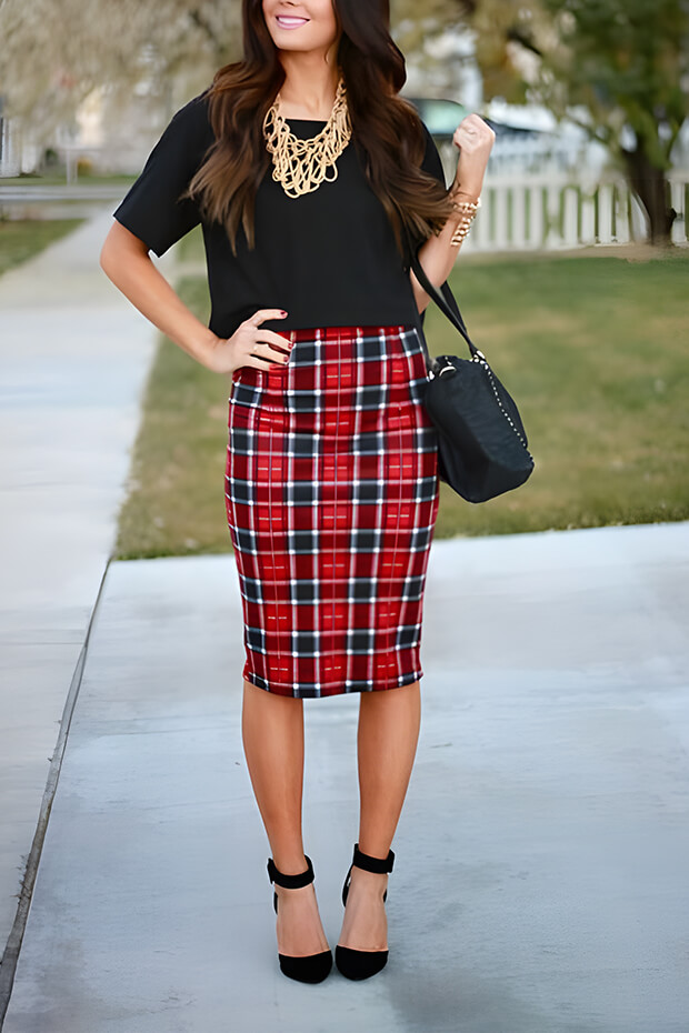 Festive holiday wedding guest look with red plaid pencil skirt