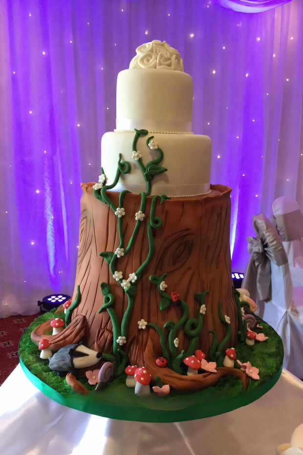 Unique tree stump cake with greenery