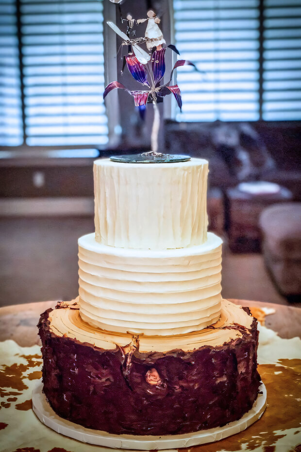 White frosting cake with purple flowers